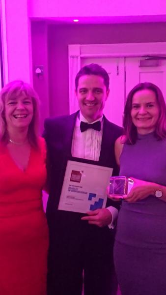 The DIB team collecting their award